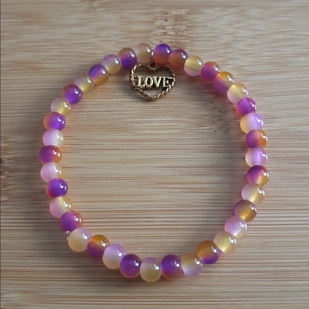 Gold and Purple Beaded Bracelet with Love Charm